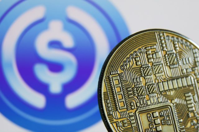 Stablecoins-are-finding-product-market-fit-in-emerging-markets.jpg Representation of cryptocurrency and USD Coin logo displayed on a screen in the background are seen in this illustration photo taken in Krakow, Poland on June 10, 2022.
