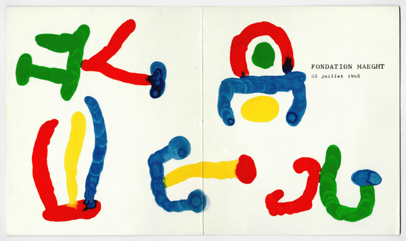 Colorful abstract shapes in red, blue, green, and yellow on a white background with the text
