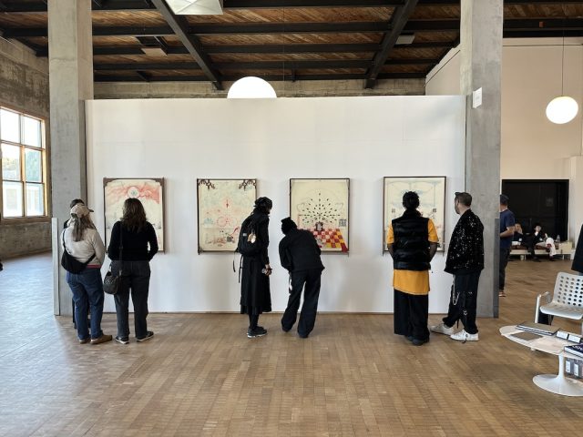 1740499805_Post-Fair-is-a-Perfect-Bite-During-LAs-Busy-Art-Week.jpg People looking at art.