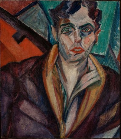 A portrait of a man where sections of his face are composed of some geometric shapes and the background also has large geometric shapes. 