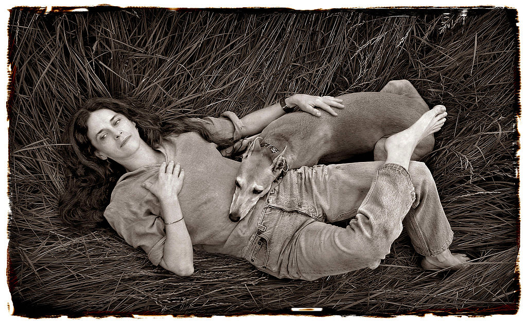 Civil-Liberty-Organizations-Demand-Police-Return-Sally-Mann-Photos.jpg Photographer Sally Mann relaxes with her dog Honey in a meadow of tall grass on her farm near Lexington, Virginia.