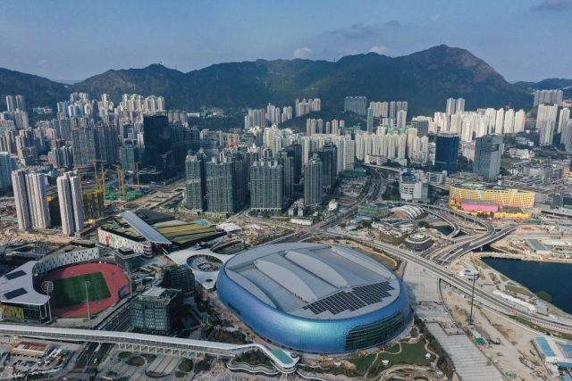 Hong-Kongs-Canceled-Digital-Art-Fair-Failed-to-Secure-Funding.jpg This photo shows an aerial view of apartment blocks and the Kai Tak Sports Park in East Kowloon in Hong Kong on February 24, 2025. (Photo by Peter PARKS / AFP) (Photo by PETER PARKS/AFP via Getty Images)