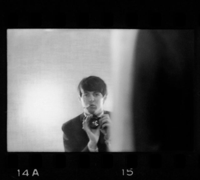 Paul-McCartneys-Beatlemania-Era-Photographs-Go-on-Sale-at-Gagosian.jpg A handsome young man photographing himself in the mirror.