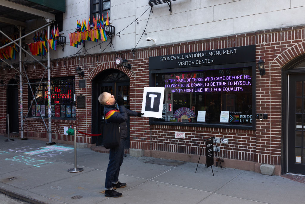 References-to-Transgender-Activists-Removed-from-Stonewall-Monument-by-National.jpg NEW YORK, NEW YORK - FEBRUARY 14: Members of the LBGTQ+ community and allies protest the removal of the word transgender from the Stonewall National Monument website during a rally outside of historic The Stonewall Inn on February 14, 2025 in New York City. Under the Trump administration, the National Park Service eliminated references to transgender people from its Stonewall National Monument website on Thursday and now only refers to those who are lesbian, gay and bisexual. Located in New York City's Greenwich Village neighborhood, the Stonewall Inn became a national monument in 2016 under former President Barack Obama, and was the country's first national park site dedicated to LGBTQ+ history. (Photo by Andrew Lichtenstein/Corbis via Getty Images)