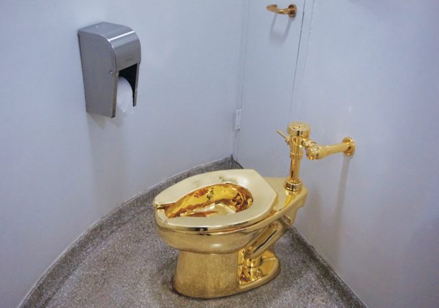 Three-Men-Charged-with-Stealing-Maurizio-Cattelans-Golden-Toilet.jpg Three Men Charged with Stealing Maurizio Cattelan's Golden Toilet
