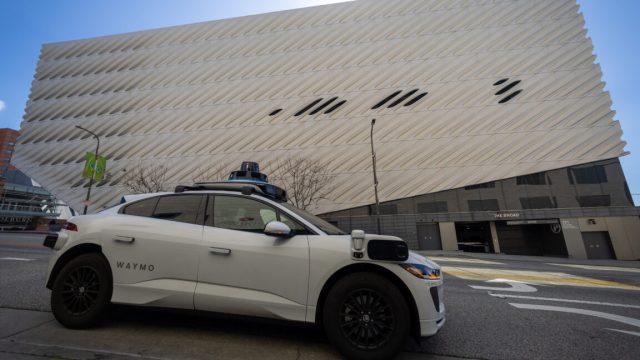 What-we-know-about-Waymos-2025-expansion-plans.jpg A Waymo robotaxi Jaguar I-PACEs driverless car parks next to The Broad in downtown Los Angeles Monday, March 11, 2024