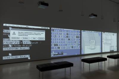 Several projections showing desktops with many file folders and windows.