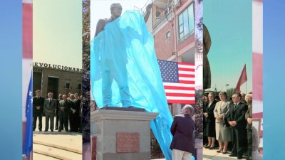 A video still composed of many overlaid images showing the unveiling of a monument.