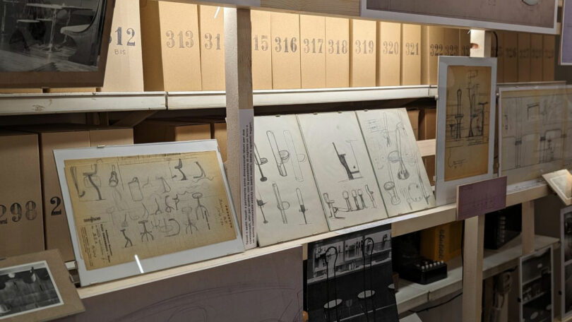 A shelf with drawings on it.