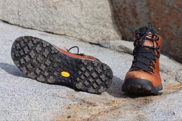 1741981984_Vasque-St-Elias-Review-GearJunkie-Tested.jpg Close-up of Vasque St. Elias boots on a rocky surface, showcasing the Vibram outsole