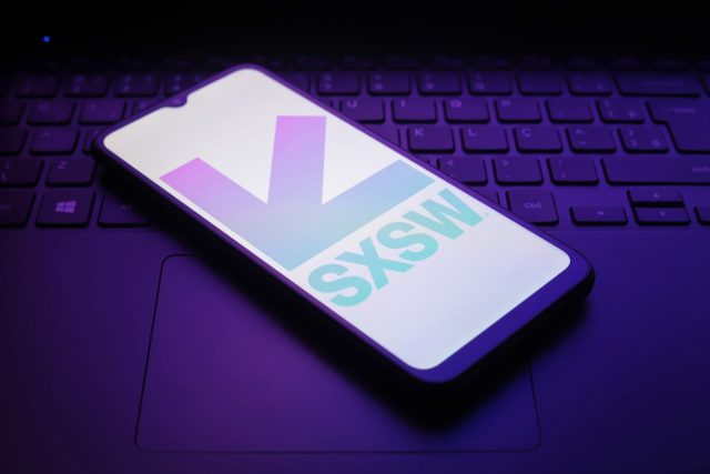 1742142484_Week-in-Review-SXSW-week-comes-to-a-close.jpg The South by Southwest (SXSW) logo appears on a smartphone screen