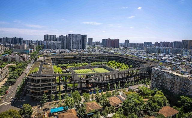 Chinese-Architect-Liu-Jiakun-Awarded-Pritzker-Prize.jpg A five-story mixed-use complex with walkways and ramps connecting open-air plazas, shops, restaurants, and sports facilities