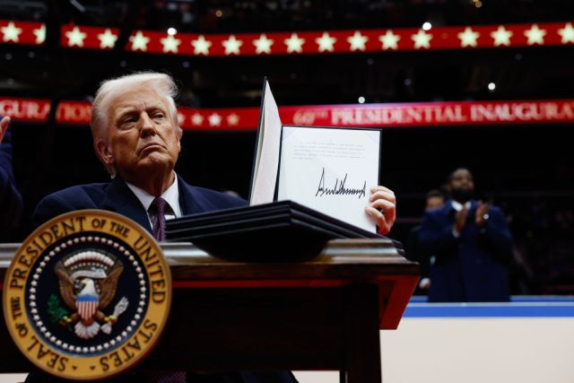 NEA-Retreats-on-‘Gender-Ideology-Pledge-for-Grant-Applications.jpg WASHINGTON, DC - JANUARY 20: U.S. President Donald Trump holds up an executive order after signing it during an indoor inauguration parade at Capital One Arena on January 20, 2025 in Washington, DC. Donald Trump takes office for his second term as the 47th president of the United States. (Photo by Anna Moneymaker/Getty Images)