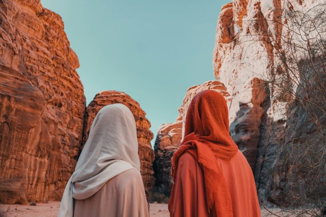 Saudi-Points-to-Gains-in-Female-Travelers.jpeg Two women in a desert landscape