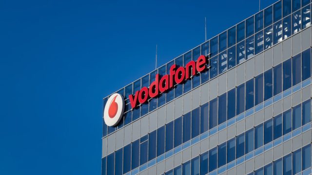 Telecom-tells-employees-they-wont-get-bonuses-if-they-dont.jpg A logo of Vodafone, British telecommunications company, is seen on the top of Globalworth Tower building, in Bucharest.