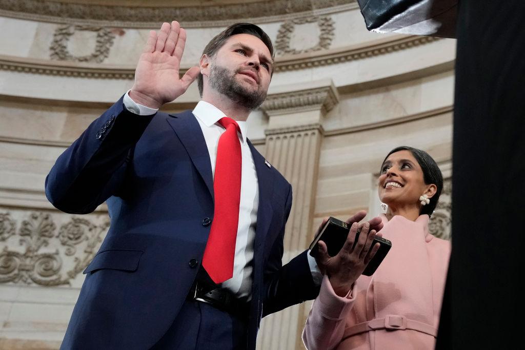 The-American-Exceptionalism-That-Made-Usha-Vance-and-Me.jpeg JD Vance is sworn in as vice president as Usha Vance holds the Bible during the 60th Presidential Inauguration in Washington on Monday, Jan. 20, 2025.