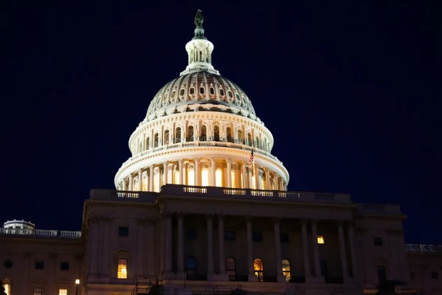 The-Risk-to-Travel-if-Theres-a-US-Government-Shutdown.jpg Congress, seen from outside at night