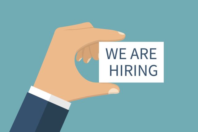 These-fintech-companies-are-hiring-in-2025-after-a-turbulent.jpg WE ARE HIRING, vector. Card with text in hands.