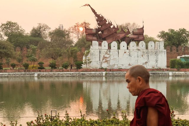 An-Earthquake-Damages-Cultural-Heritage-Sites-in-Myanmar-and-Thailand.jpg A Buddhist monk walks past the damaged Mandalay Palace after the deadly 2025 Myanmar earthquake.