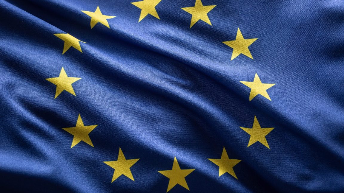 Apple-and-Meta-furious-at-EU-over-fines-totaling-E700.jpg A European Union flag blowing in the wind.
