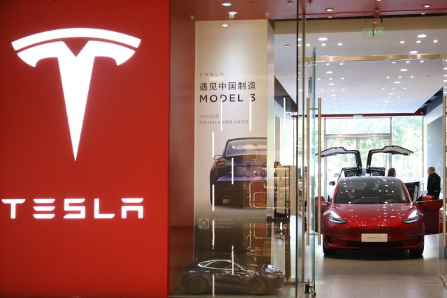 Automakers-selling-cars-in-China-banned-from-using-autonomous-driving.jpg A Tesla Model 3 electric vehicle is displayed for sale at a Tesla showroom on October 12, 2020 in Beijing, China.