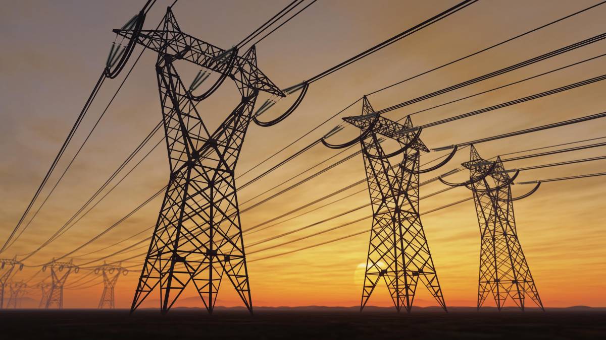 Former-Tesla-exec-Drew-Baglinos-new-startup-is-rethinking-the.jpeg Power lines loom on the horizon at sunset.