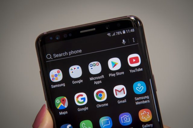 Google-fixes-two-Android-zero-day-bugs-actively-exploited-by-hackers.jpg Android app icons on the home screen of a Samsung Galaxy S9 smartphone.