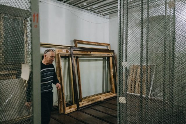 Ukraine-Minister-Accuses-Russia-of-Selling-Stolen-Cultural-Property.jpg KHERSON, UKRAINE - FEBRUARY 19: Ihor works as he shows the robbed treasury in the Art Museum, Kherson, Ukraine where was robbed of most of its exhibits and appear in various Russian museums now, within the 2nd anniversary of the Russia-Ukraine war on February 19, 2024. (Photo by Wojciech Grzedzinski/Anadolu via Getty Images)