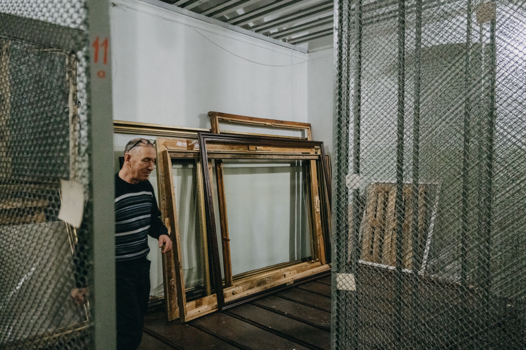 KHERSON, UKRAINE - FEBRUARY 19: Ihor works as he shows the robbed treasury in the Art Museum, Kherson, Ukraine where was robbed of most of its exhibits and appear in various Russian museums now, within the 2nd anniversary of the Russia-Ukraine war on February 19, 2024. (Photo by Wojciech Grzedzinski/Anadolu via Getty Images)