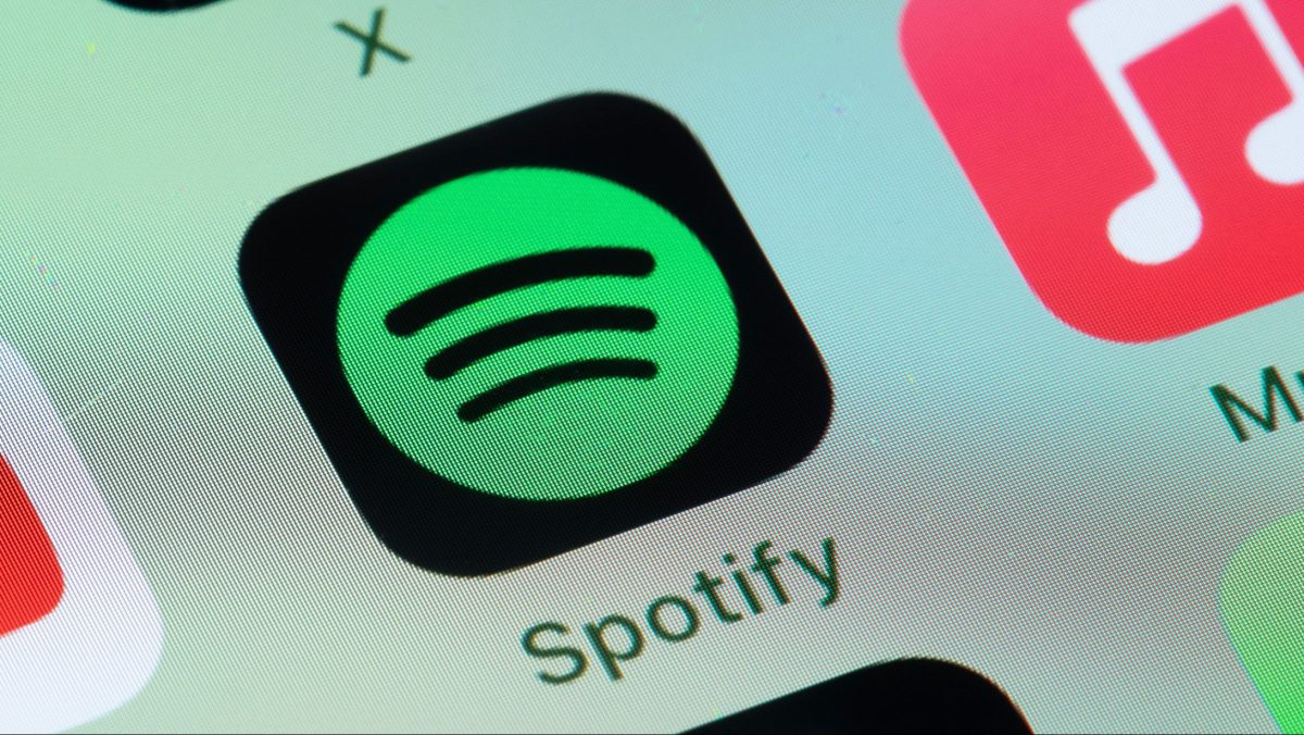 1747903684_Spotifys-new-Upcoming-Releases-hub-highlights-future-albums-you-may.jpg Spotify, Apple Music on smart phone screen.