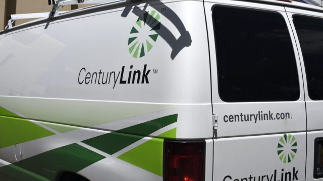 ATT-has-6-billion-deal-to-buy-CenturyLink-fiber-broadband.jpg A CenturyLink service van seen from behind, with several CenturyLink logos visible.