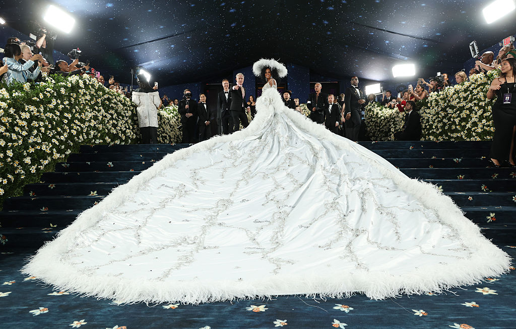 All-the-Best-Black-Dandyism-Looks.jpg A Black woman in a long white dress.