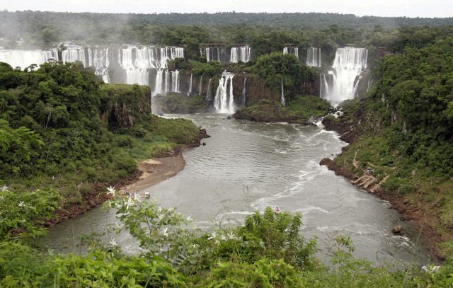 Centre-Pompidou-to-Open-New-Brazil-Satellite.jpg Partial view of the Argentine side of Iguazu Falls and San Martin island from the Brazilian side of the Iguazu River near the Brazilian city of Foz do Iguazu, 17 January 2007. AFP PHOTO/Juan MABROMATA (Photo by Juan MABROMATA / AFP) (Photo by JUAN MABROMATA/AFP via Getty Images)