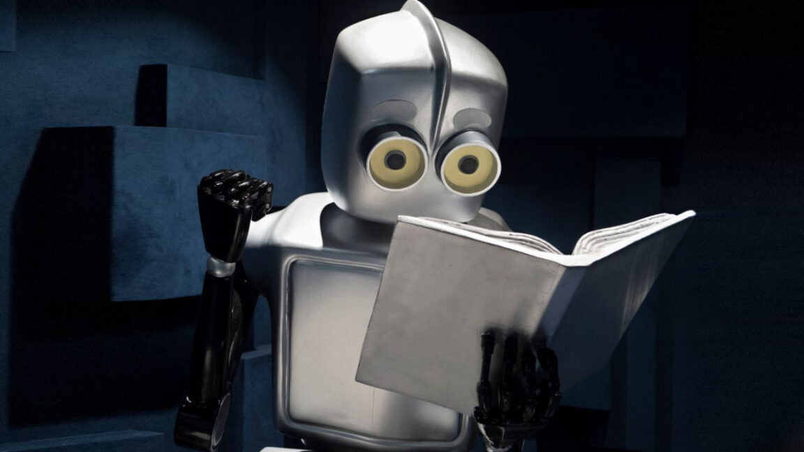 Claudes-AI-research-mode-now-runs-for-up-to-45.jpg Illustration of studious robot reading a book