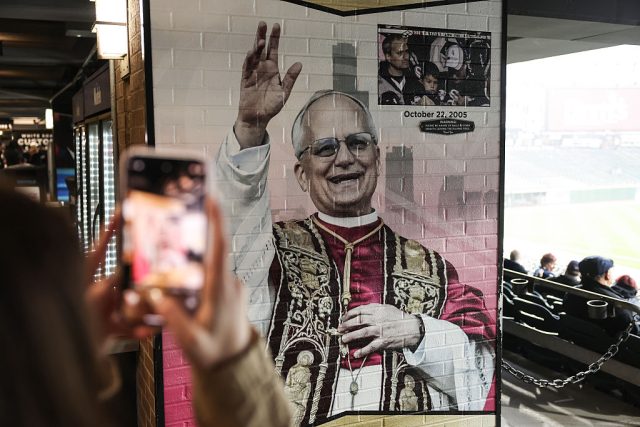 From-South-Side-to-St-Peters-Pope-Leo-XIV-Gets.jpg CHICAGO, ILLINOIS - MAY 20: Fans take pictures of the mural of Pope Leo XIV during a rain delay in the game between the Seattle Mariners and Chicago White Sox at Rate Field on May 20, 2025 in Chicago, Illinois. (Photo by Geoff Stellfox/Getty Images)