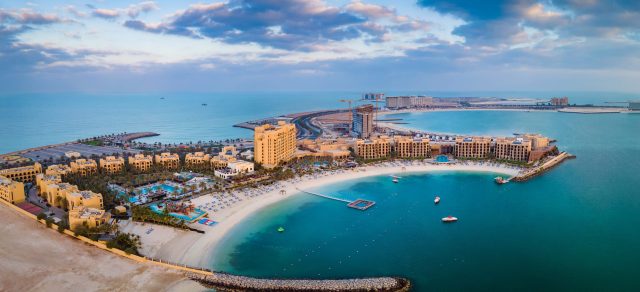 Ras-Al-Khaimah-Wants-to-Be-a-Destination-for-Disabled.jpeg An image of a man-made island with hotels.