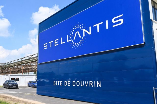 Stellantis-pivots-to-Googles-Android-as-in-car-partnership-with-Amazon.jpg sign at the entrance of the plant of Dutch multinational automotive manufacturing company Stellantis