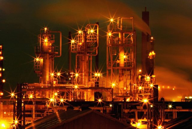Trump-administration-to-claw-back-37B-in-clean-energy-and.jpg Huge oil refinery complex.
