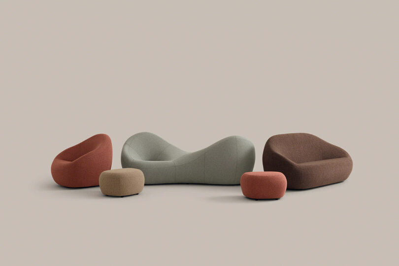 Five modern, rounded upholstered seats in muted earth tones are arranged on a plain background, including two ottomans, an armchair, a sofa, and a loveseat.