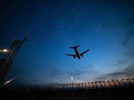 plan flying at dusk