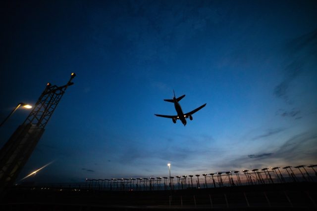 FBI-cybersecurity-firms-say-a-prolific-hacking-crew-is-now.jpg plan flying at dusk