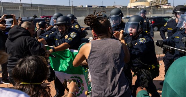 LA-Protests-Intensify-With-Mass-Arrests-Despite-Curfew.jpg L.A. Protests Intensify With 'Mass Arrests' Despite Curfew