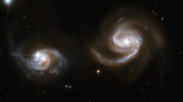 Milky-Way-galaxy-might-not-collide-with-Andromeda-after-all.jpg NGC 6786, a pair of interacting galaxies.