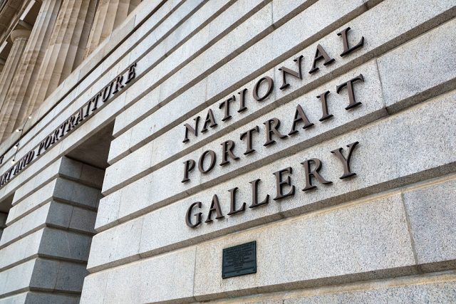National-Portrait-Gallery-Head-Resigns-After-Trump-Says-He-Fired.jpg The facade of a building with text reading 'National Portrait Gallery.'