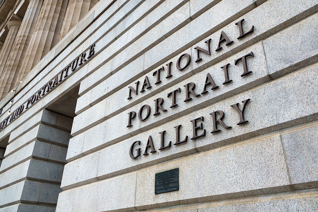 National-Portrait-Gallery-Head-Resigns-After-Trump-Says-He-Fired.jpg The facade of a building with text reading 'National Portrait Gallery.'