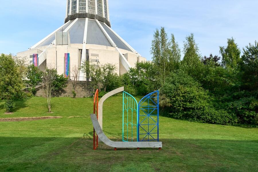 Colourful sculpture on grass