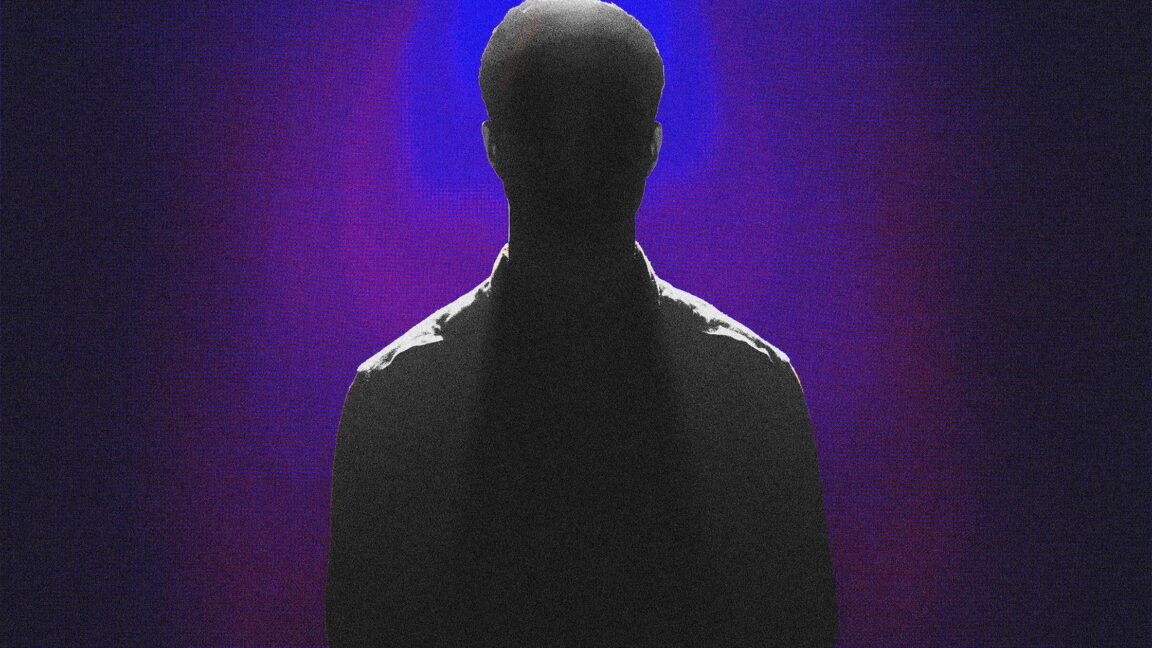 Ransomware-kingpin-Stern-apparently-IDed-by-German-law-enforcement.jpg Silhouette of a man against a dimly lit backtround