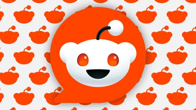 Reddit-now-lets-you-hide-content-like-posts-and-comments.webp.jpeg large Reddit logo overlaying background of smaller logo silhouettes