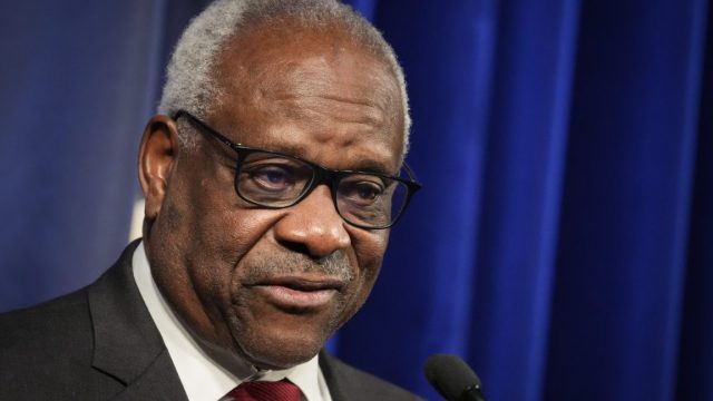 Supreme-Court-upholds-Texas-porn-law-that-caused-Pornhub-to.jpg Supreme Court Justice Clarence Thomas speaking into a microphone at an event.