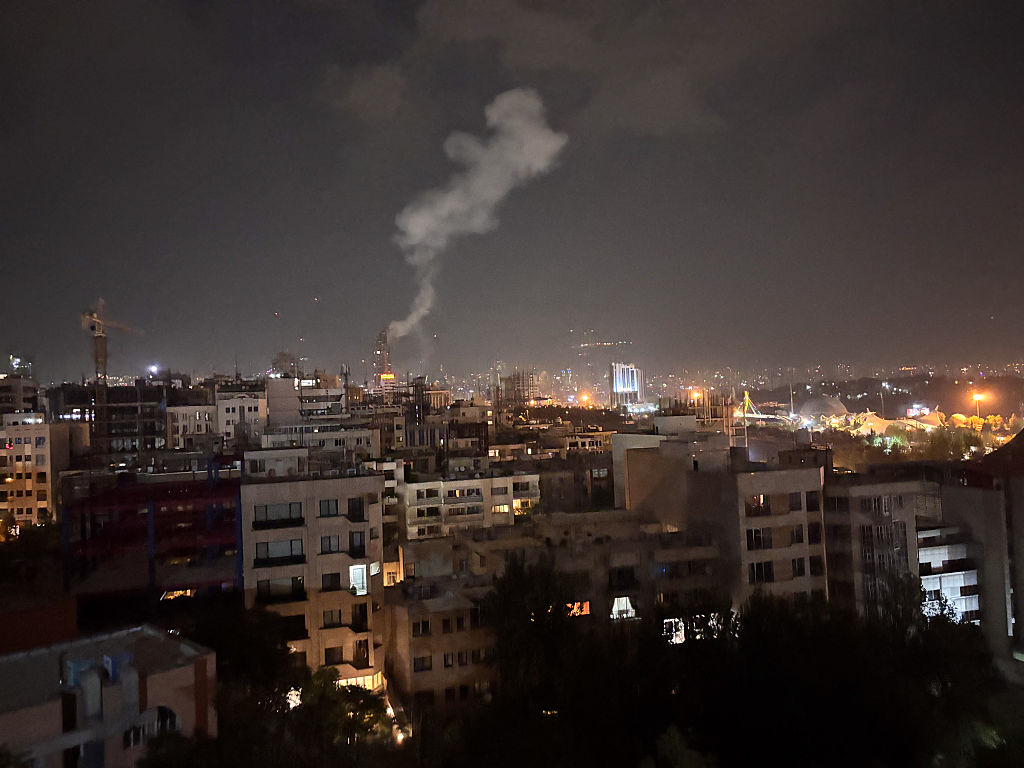Tehran-Galleries-React-to-Israeli-Missile-Attack.jpg Smoke rises from a location allegedly targeted in Israel's wave of strikes on Tehran, Iran, on early morning of June 13, 2025. (Photo by SAN / Middle East Images via AFP) (Photo by SAN/Middle East Images/AFP via Getty Images)